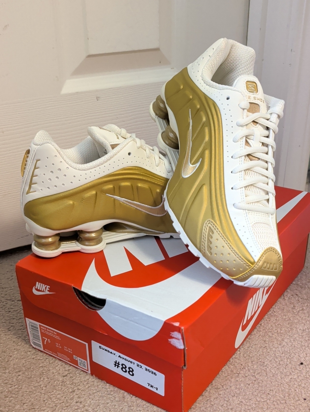 Nike Women’s White and Gold Shox Sneakers